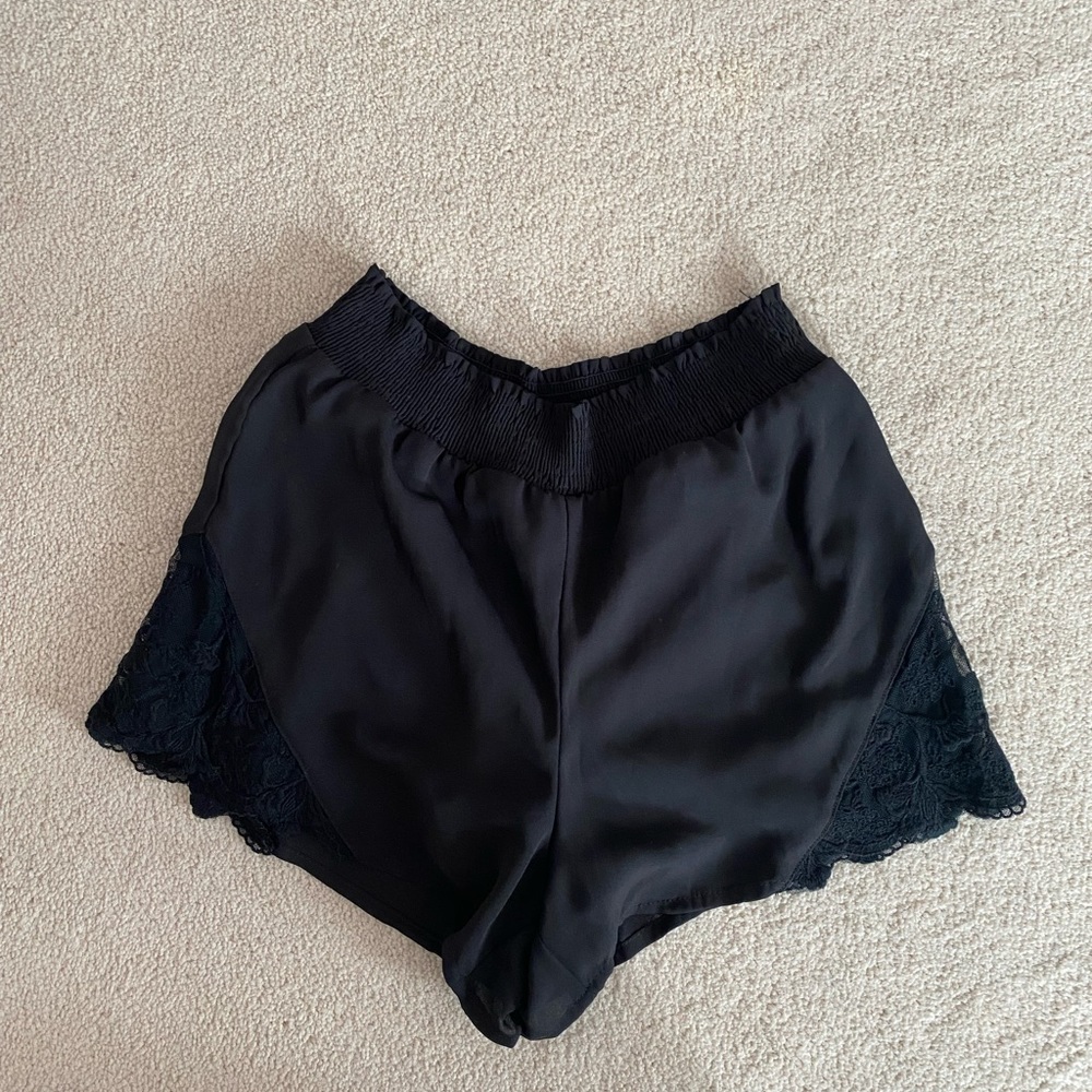 Black shorts with lace side panel